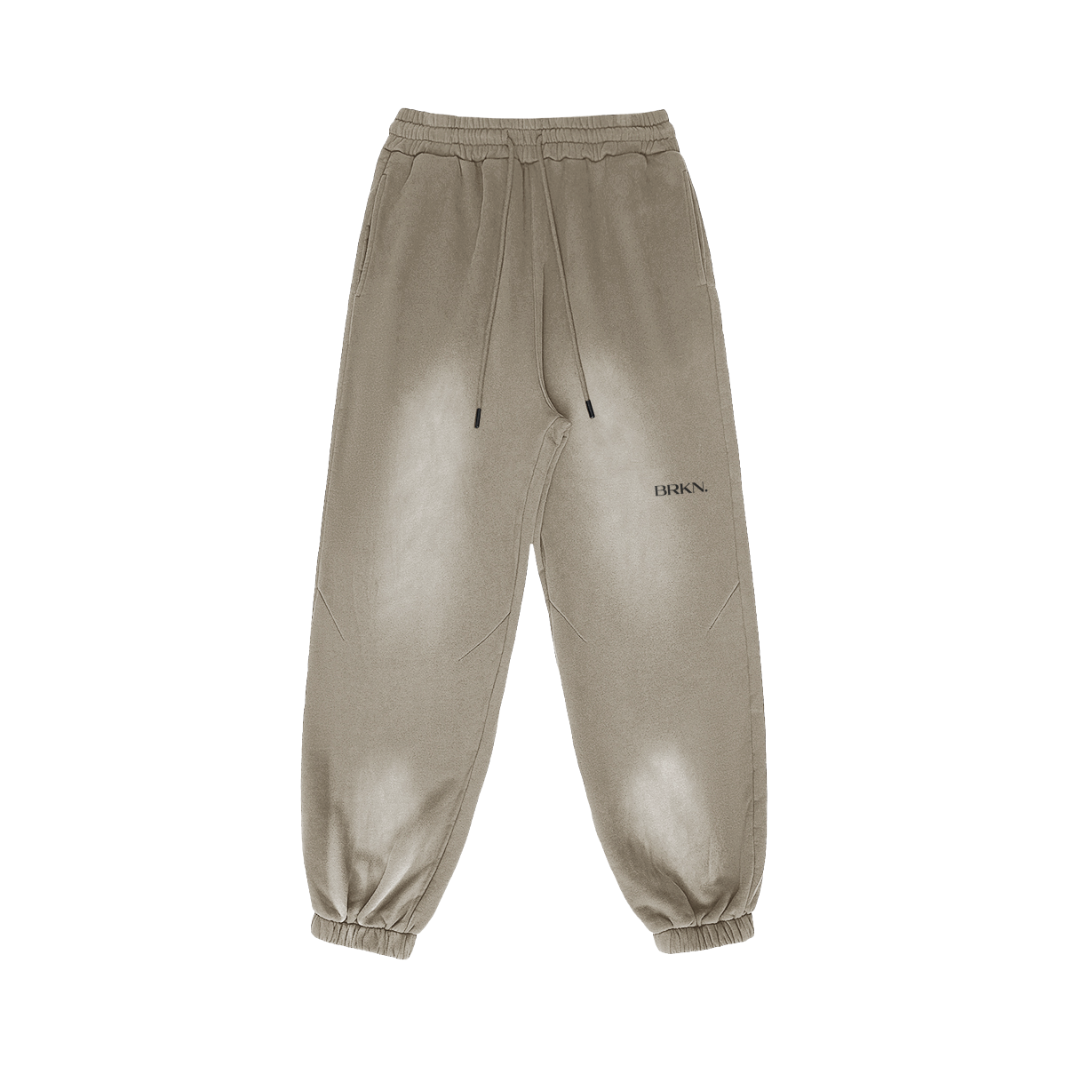 Beige minimalist sweatpants with BRKN. logo, drawstring waist, and tapered cuffs for streetwear style