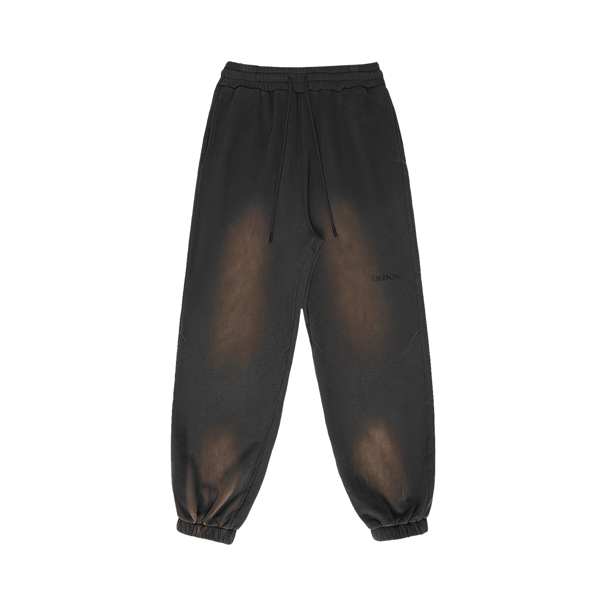 Black distressed sweatpants with drawstring waist, cuffed ankles, and subtle BRKN logo, minimalist streetwear style