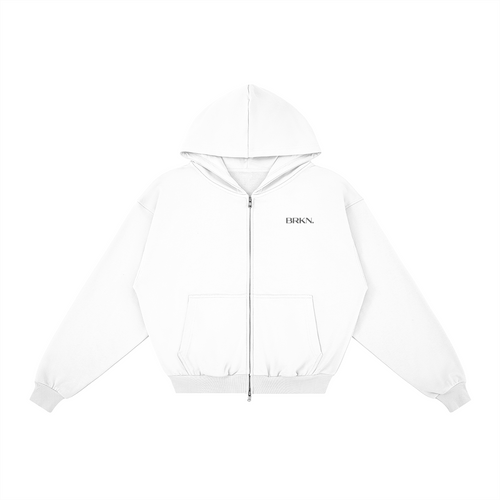 White zip-up hoodie with BRKN. logo, minimalist streetwear design, front pocket, and hood