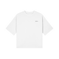 White minimalist streetwear t-shirt with subtle BRKN. logo, oversized fit, clean design for everyday wear